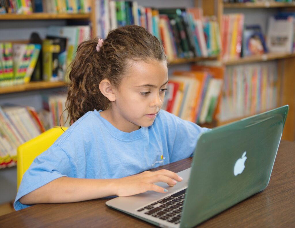 Middle School Student studying on a Laptop