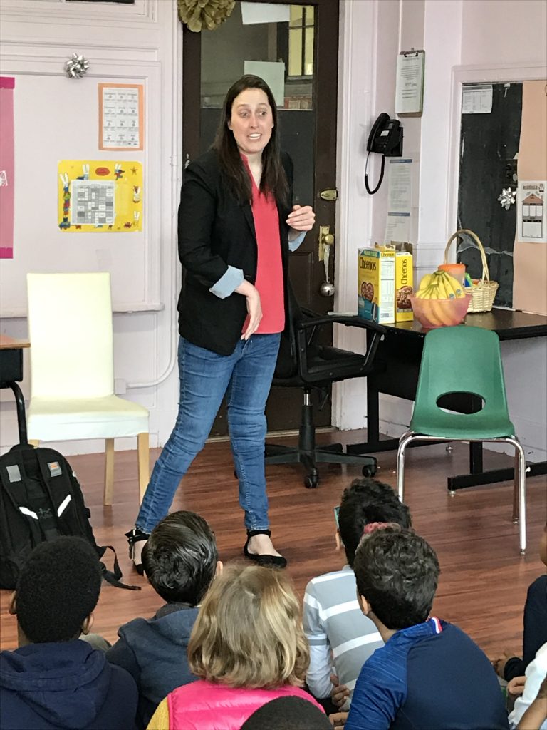 Kesley Tainsh delivering her message about diversity and inclusion to French American Academy's students